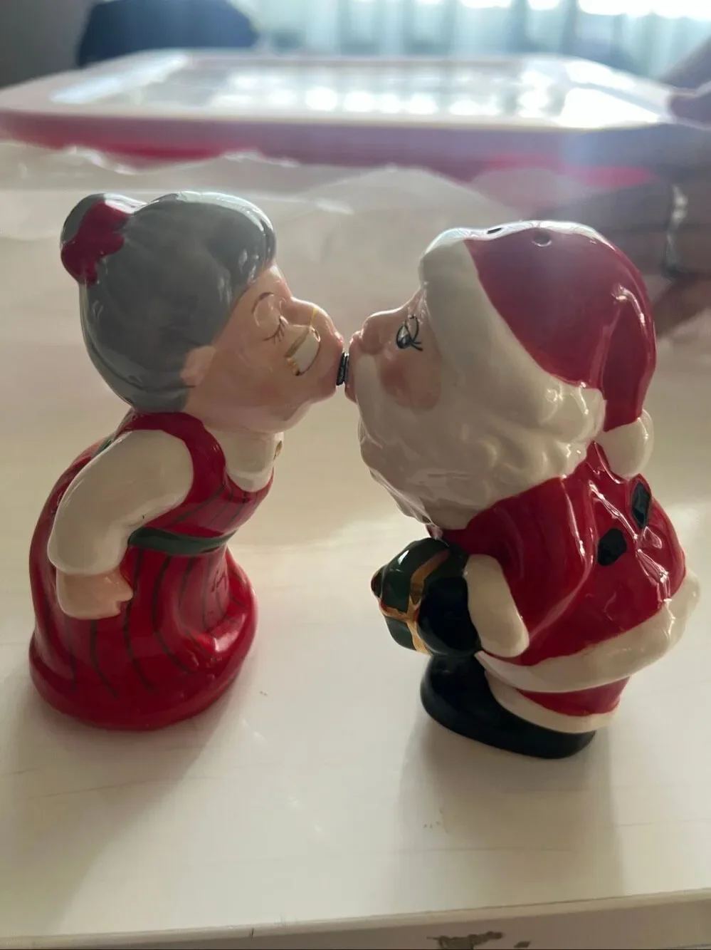 Ceramic Multicolor Santa And Mrs Claus Kissing Salt & Pepper Shaker Set